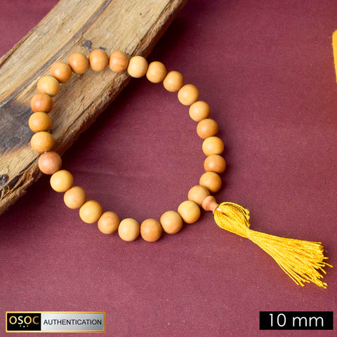 Handcrafted 10mm 27 Bead White Chandan Money Mala made from pure sandalwood beads for meditation, mantra chanting, and attracting wealth and positive energy.India’s Premium Jap Mala Store - www.satvikworld.com
