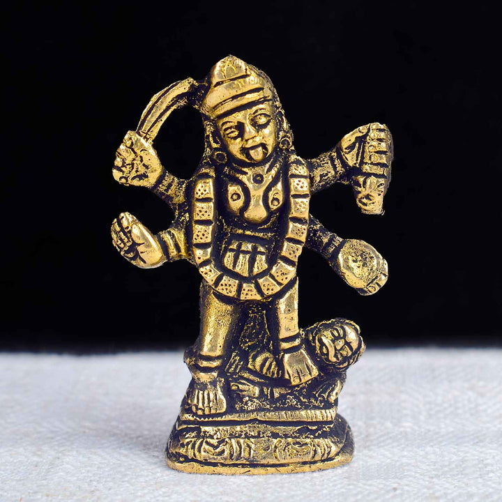 2.2-inch Kali Mata dashboard figurine intricately crafted with vivid detailing, depicting Goddess Kali in a fierce stance with traditional ornaments and weapons, designed for spiritual presence and protection in vehicles or personal spaces. India’s Largest Pooja Accessories Brand- www.satvikworld.com