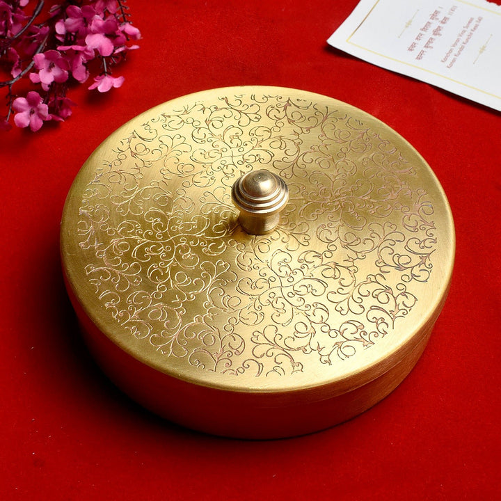 Brass Pooja Samagridaan set featuring 7 containers with a spoon, designed for organizing puja items, ideal for traditional rituals and pooja ceremonies. India’s Largest Pooja Accessories Brand – www.satvikworld.com