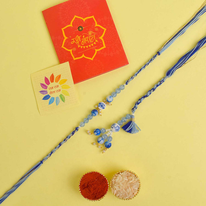 Designer Couple Rakhi Set for Bhaiya and Bhabhi with Roli Chawal and Ram Sita Stickers – Raksha Bandhan Gift Combo. India’s Largest Brass Idols Brand - www.satvikworld.com