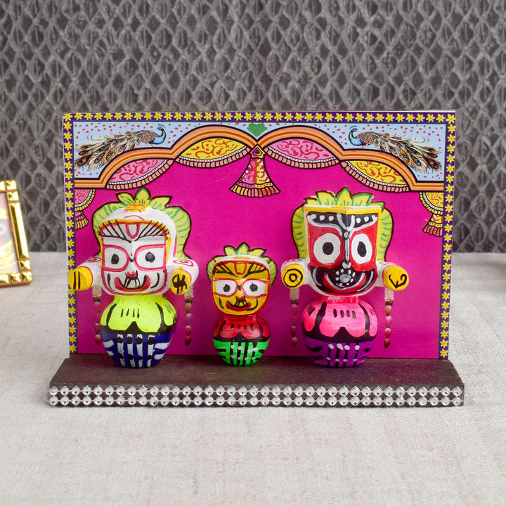 Handcrafted wooden Lord Jagannath idol with traditional detailing, ideal for devotion, travel blessings, and spiritual decor in home or vehicle. India’s Largest Pooja Accessories Brand - www.satvikworld.com