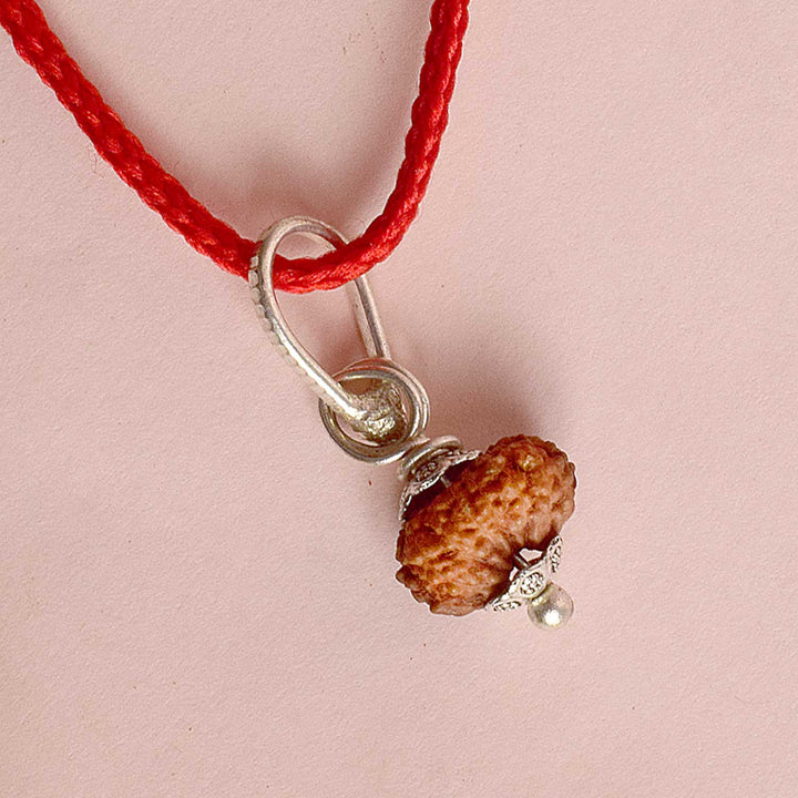 Certified 14 Mukhi Rudraksha Pendant with metal capping for spiritual strength and intuition. India’s Premium Rudraksha Jap Mala Store- www.satvikworld.com