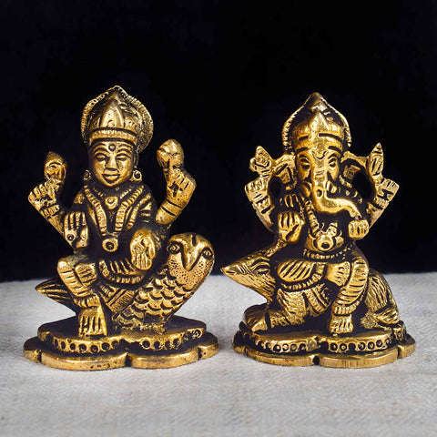 2.6-inch brass Lakshmi Ganesha idol, featuring Goddess Lakshmi and Lord Ganesha in a majestic pose, intricately crafted with vibrant details. Ideal for bringing blessings of prosperity and wisdom to your car dashboard. India’s Largest Pooja Accessories Brand – www.satvikworld.com.