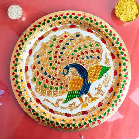 Decorative stainless steel pooja thali with elegant peacock design ideal for aarti and festive rituals India’s Largest Pooja Accessories Brand – www.satvikworld.com