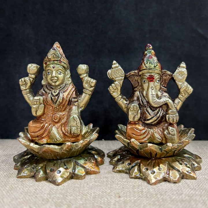 2.8-inch exquisite handcrafted brass Lakshmi Ganesha idol, showcasing intricate details of Goddess Lakshmi and Lord Ganesha seated together, symbolizing prosperity, wisdom, and divine blessings. Ideal for home, puja, or gifting. India’s Largest Pooja Accessories Brand – www.satvikworld.com