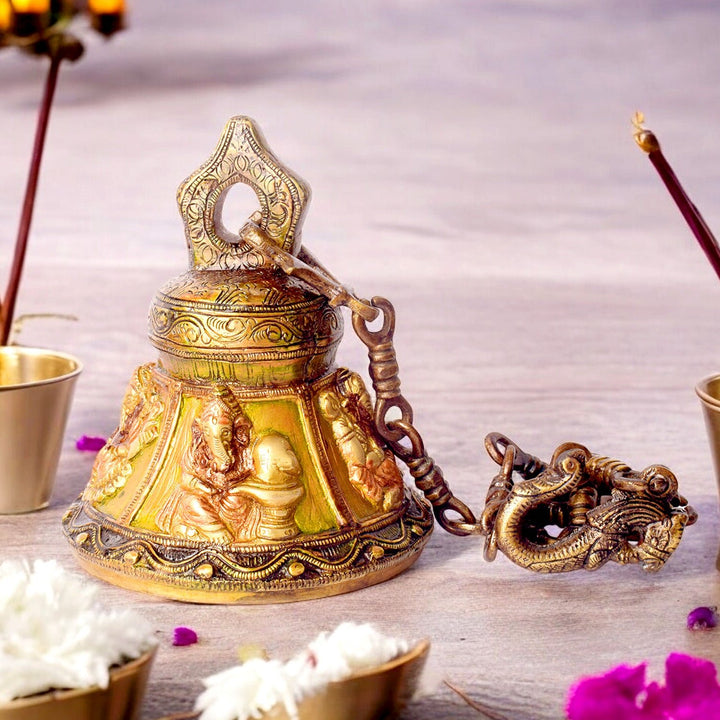 Brass Temple Bell (Ghanta) with Embossed Ganesh Ji, a beautifully crafted bell featuring Lord Ganesha's engraving. Ideal for pooja rituals, it adds a divine touch to your temple or spiritual space, bringing blessings of success and prosperity. India’s Largest Pooja Accessories Brand – www.satvikworld.com