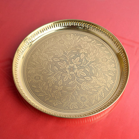 Shop Traditional Vintage Brass Floral Thali with intricate floral carvings, perfect for pooja rituals, festive celebrations, and temple décor. A timeless addition to your spiritual setup. Satvikworld.com