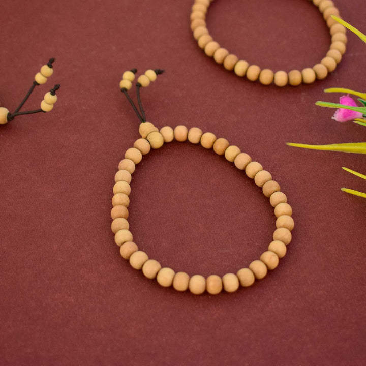 Elegant handcrafted White Chandan Bracelet made from pure white sandalwood beads, offering peace, emotional calm, and spiritual clarity—perfect for meditation, pooja, or daily wear. India’s Largest Pooja Accessories Brand - www.satvikworld.com