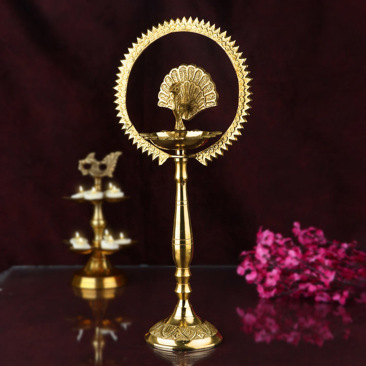 20 Inch Mor Kiran Style Brass Kerala Diya – Stunning handcrafted brass diya in traditional Mor Kiran design, ideal for Kerala pooja rituals, temple decor, and spiritual ceremonies. India’s Largest Pooja Accessories Brand – www.satvikstore.in