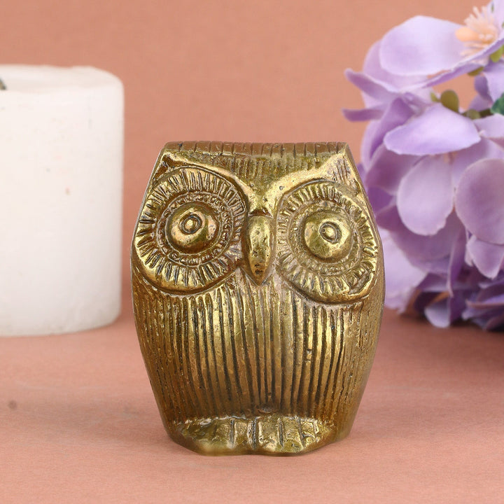 Petite brass engraved owl (Ullu), representing Lakshmi's vaahan (vehicle), intricately detailed with traditional carvings. Symbolizing wisdom and prosperity, perfect for spiritual décor or as a symbol of divine guidance. India’s Largest Pooja Accessories Brand – www.satvikworld.com