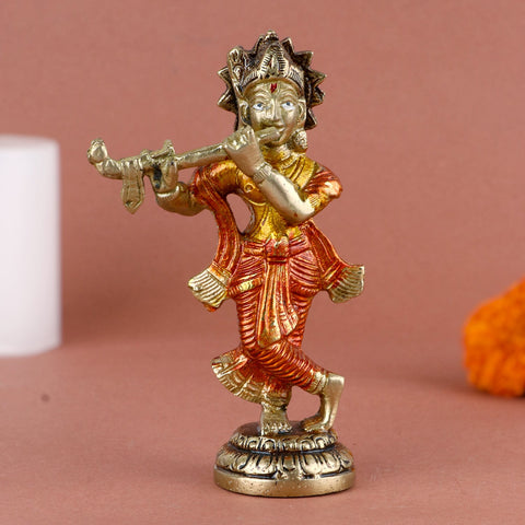 Desirable colorful brass idol of Lord Krishna, adorned with vibrant hues and fine detailing, capturing the essence of divine music and devotion. Ideal for spiritual décor, puja rituals, or as a symbol of grace and joy. India’s Largest Pooja Accessories Brand – www.satvikworld.com