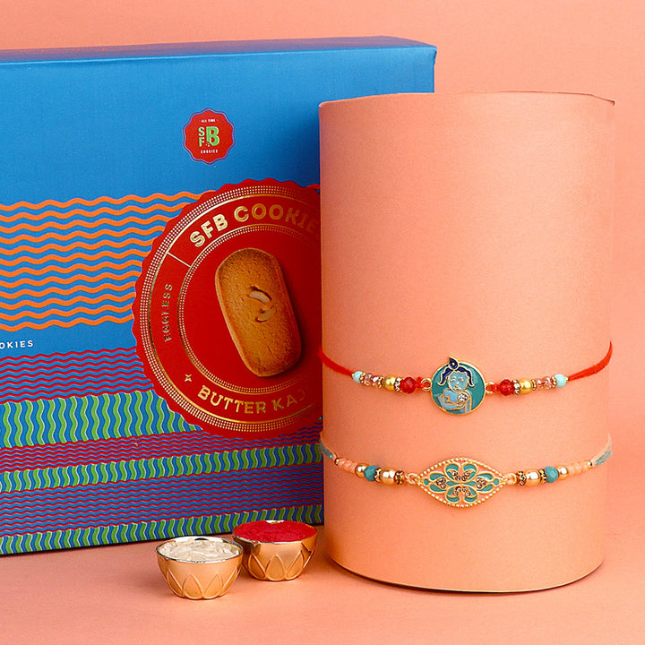 Image of a beautifully designed Rakhi with sweets, the perfect combination of tradition and sweetness for Raksha Bandhan celebration. Shop now at SatvikStore.in. #Rakhi #RakhiOnline #SendRakhi #DesignerRakhi #BeautifulRakhi #LatestRakhi #NewRakhi #ModernRakhi"