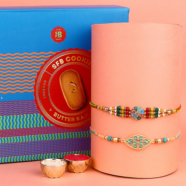 Image of a beautifully designed Rakhi with sweets, the perfect combination of tradition and sweetness for Raksha Bandhan celebration. Shop now at SatvikStore.in. #Rakhi #RakhiOnline #SendRakhi #DesignerRakhi #BeautifulRakhi #LatestRakhi #NewRakhi #ModernRakhi"