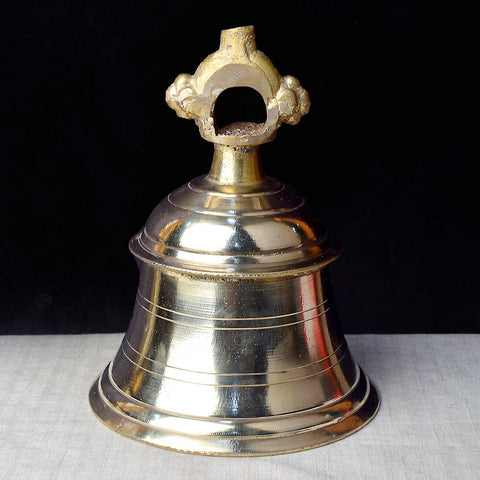 4.7-inch authentic brass temple bell (mandir ghanta), finely crafted with a sturdy handle and rich sound, ideal for daily worship and temple rituals. India’s Largest Pooja Accessories Brand – www.satvikworld.com
