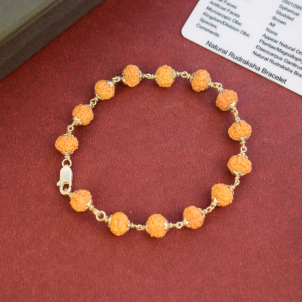 Certified Natural Rudraksha Bracelet with silver capping featuring peach beads for spiritual protection and daily wear. India’s Premium Rudraksha Jap Mala Store- www.satvikworld.com
