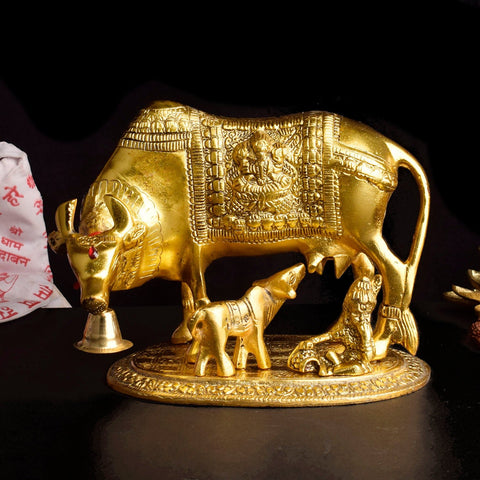 Divine Kamdhenu cow idol featuring Laddu Gopal and a calf, intricately crafted in brass to symbolize abundance, purity, and divine nurturing. Perfect for home temples, gifting, or auspicious decor. India’s Largest Pooja Accessories Brand – www.satvikworld.com