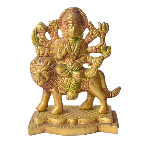 3.1-inch Sherawali Mata idol made of colored brass, featuring the goddess seated on a lion with vibrant attire and detailed ornaments, mounted on a sturdy base—ideal for invoking divine blessings in home or car settings. India’s Largest Pooja Accessories Brand- www.satvikworld.com