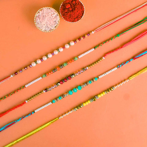 Set of 5 Designer Rakhi Threads with Roli Chawal and Ram Sita Stickers for Raksha Bandhan Celebration. India’s Largest Pooja Accessories Brand - www.satvikworld.com