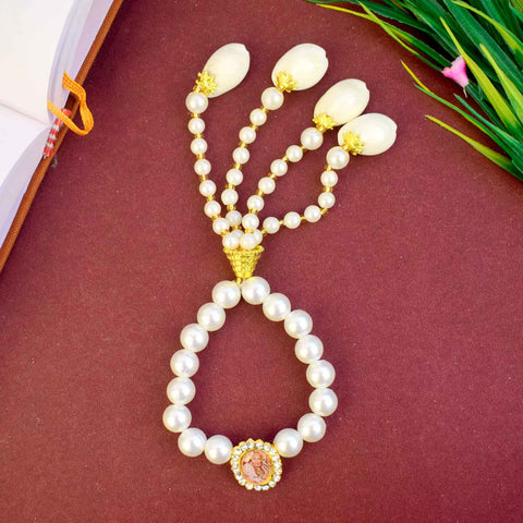 Elegant white pearl Guruji Swaroop Bracelet with handcrafted latkan, ideal for festive occasions, gifting, and spiritual connection. India’s Largest Pooja Accessories Brand – www.satvikworld.com