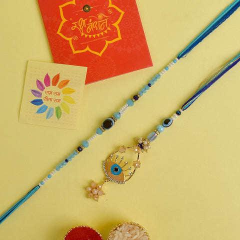 Designer Couple Rakhi Set for Bhaiya and Bhabhi with Roli Chawal and Ram Sita Stickers – Raksha Bandhan Gift Combo. India’s Largest Brass Idols Brand - www.satvikstore.in