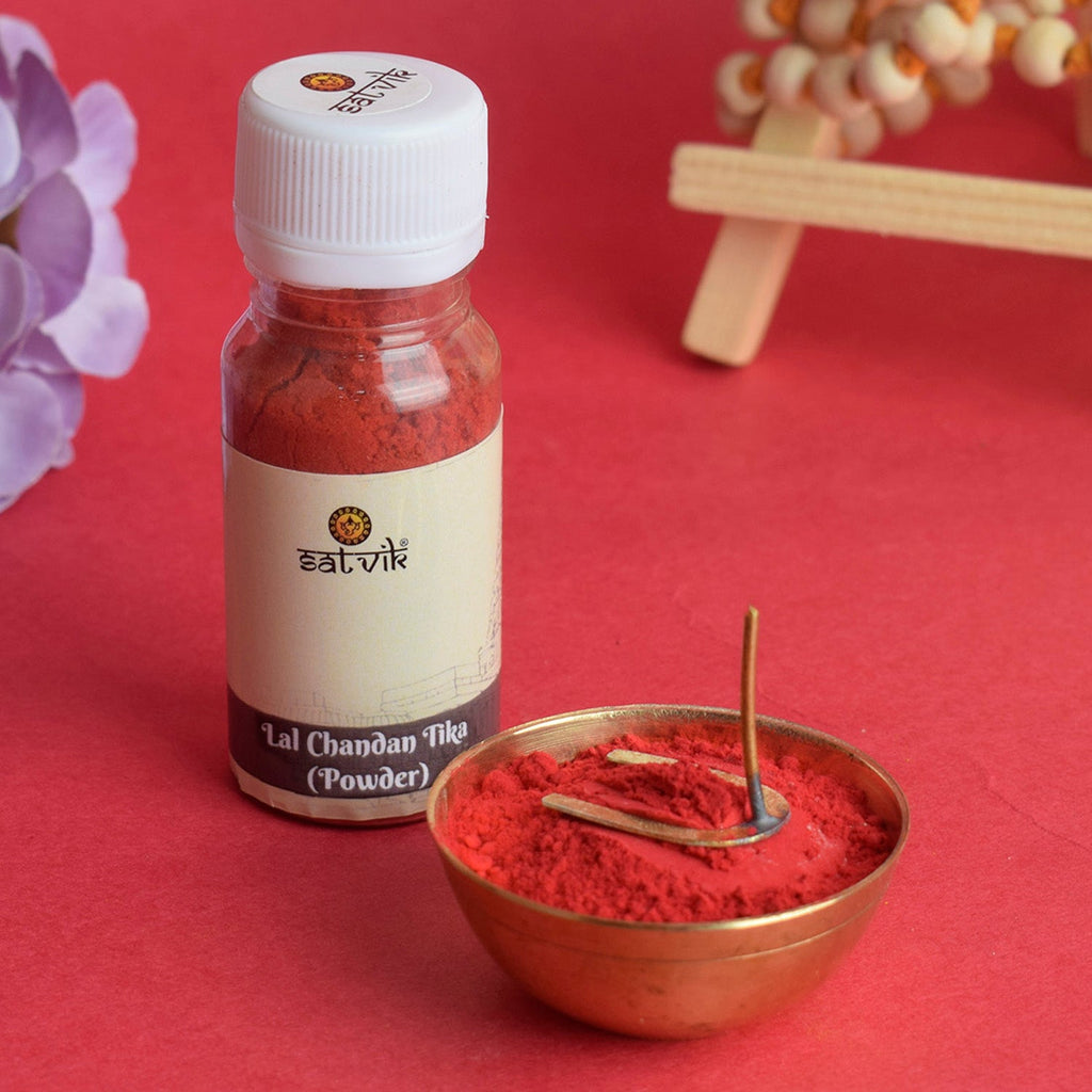 Red Chandan Tika (Tilak) Powder in a traditional container, used for forehead application during religious ceremonies, rituals, and devotional practices. India’s Largest Pooja Accessories Brand – www.satvikworld.com