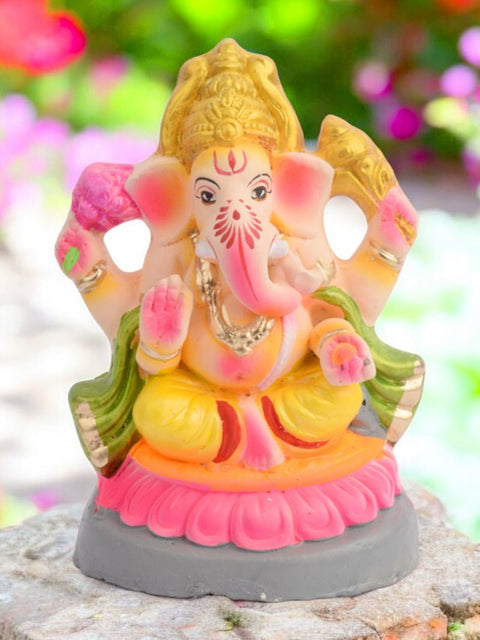 6.5-inch Shayana Ganesha eco-friendly idol with a green patka, depicting Ganesha in a serene, reclining pose, crafted with sustainable materials for an eco-friendly celebration. India’s Largest Pooja Accessories Brand – www.satvikworld.com
