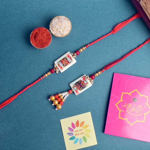 Designer Couple Rakhi Set for Bhaiya and Bhabhi with Roli Chawal and Ram Sita Stickers – Raksha Bandhan Gift Combo. India’s Largest Brass Idols Brand - www.satvikworld.com