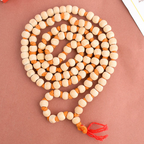 White Wooden Jaap Mala with 108+1 beads, perfect for meditation and chanting mantras. Crafted from durable white wood, offering a calm and grounding energy. India’s Largest Pooja Accessories Brand – www.satvikworld.com