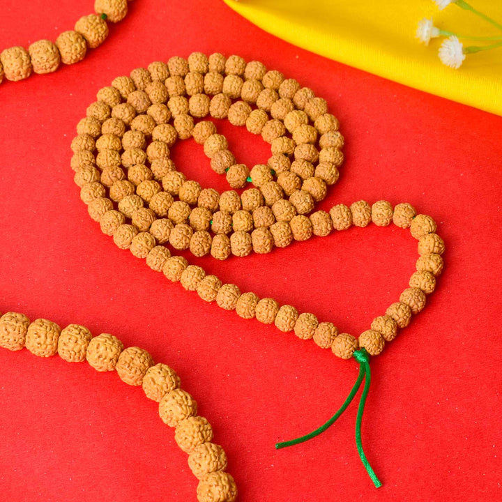 semi Pathariya Rudraksha Mala with natural brown beads for meditation and spiritual chanting. India’s Premium Rudraksha Jap Mala Store- www.satvikworld.com
