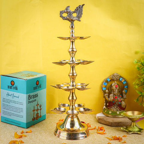 Brass 4 Step Panchmukhi Peacock Kerala Diya – Traditional four-step brass diya with panchmukhi design and detailed peacock carving, ideal for pooja ceremonies, temples, and festive rituals. India’s Largest Pooja Accessories Brand – www.satvikstore.in