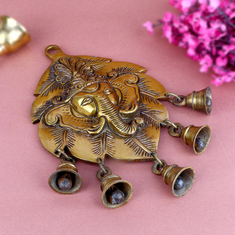 Brass Decorative Ganesh Wall Hanging in Leaf Shape – Traditional wall decor with Lord Ganesha engraving on leaf design, made from brass. India’s Largest Pooja Accessories Brand – www.satvikworld.com