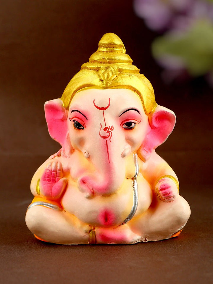 4.5-inch eco-friendly Bal Ganesha idol, vibrantly hand-painted in multiple colors, adorned with a golden mukut, and seated in a serene Padmasana pose, crafted from biodegradable Shadu Mati clay. India’s Largest Pooja Accessories Brand – www.satvikworld.com