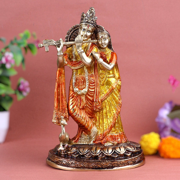 Engrossing Radha Krishna With Flute/Bansuri Brass Idol, A Captivating Representation of Lord Krishna Holding His Flute, with Radha in Divine Adoration. This Handcrafted Brass Idol Embodies the Deep Spiritual Connection Between the Two and Enhances Your Sacred Space. Perfect for Temple or Home Decor, Bringing a Touch of Eternal Love and Divine Blessings. India’s Largest Pooja Accessories Brand – www.satvikworld.com
