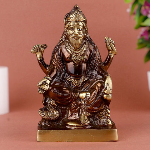 Brass Lord Vishwakarma Dev Idol – Exquisite Brass Statue of Lord Vishwakarma, the Divine Architect and Creator of the Universe, Symbolizing Skill, Craftsmanship, and Divine Blessings, Perfect for Temple, Home Decor, and Spiritual Worship, Handcrafted with Intricate Detailing for a Sacred Touch, Ideal for Puja and Mandir Decoration, Buy Vishwakarma Dev Idol Online, Affordable God Statue Prices | India’s Largest Pooja Accessories Brand – www.satvikworld.com
