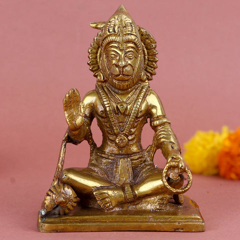 Brass sitting Hanuman statue, gracefully crafted to depict Lord Hanuman in a calm seated posture, symbolizing devotion, strength, and protection. Ideal for home temples, spiritual corners, or as a devotional gift. India’s Largest Pooja Accessories Brand – www.satvikworld.com