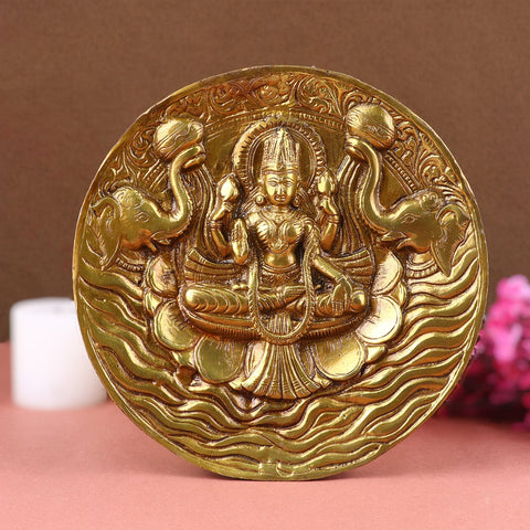 Brass Lakshmi Wall Hanging Plate – Divine Wall Decor Featuring Goddess Lakshmi, Symbolizing Wealth, Prosperity, and Good Fortune, Perfect for Enhancing Temple Spaces, Home Entrances, and Sacred Corners, Beautifully Handcrafted with Intricate Detailing, Ideal for Festive Decoration and Spiritual Ambience, Buy Lakshmi Wall Hanging Online, Affordable Pooja Decor Prices | India’s Largest Pooja Accessories Brand – www.satvikworld.com