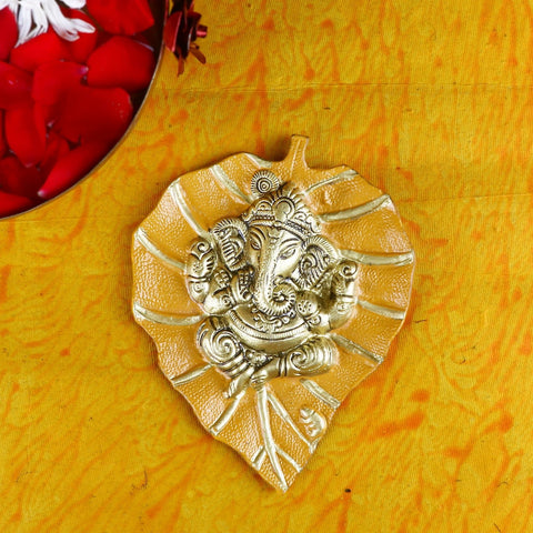 Yellow Lord Ganesh on Leaf Patta Wall Hanging – Vibrant spiritual wall art for home and temple decor. India’s Largest Pooja Accessories Brand – www.satvikworld.com