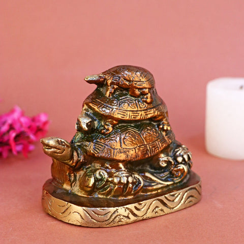 Brass statue featuring three tortoises stacked together, symbolizing stability, longevity, and layered prosperity in Vastu and Feng Shui traditions. Perfect for home or office décor. India’s Largest Pooja Accessories Brand – www.satvikworld.com